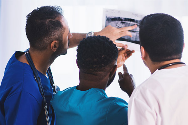 Malpractice lawyer looking at medical malpractice case